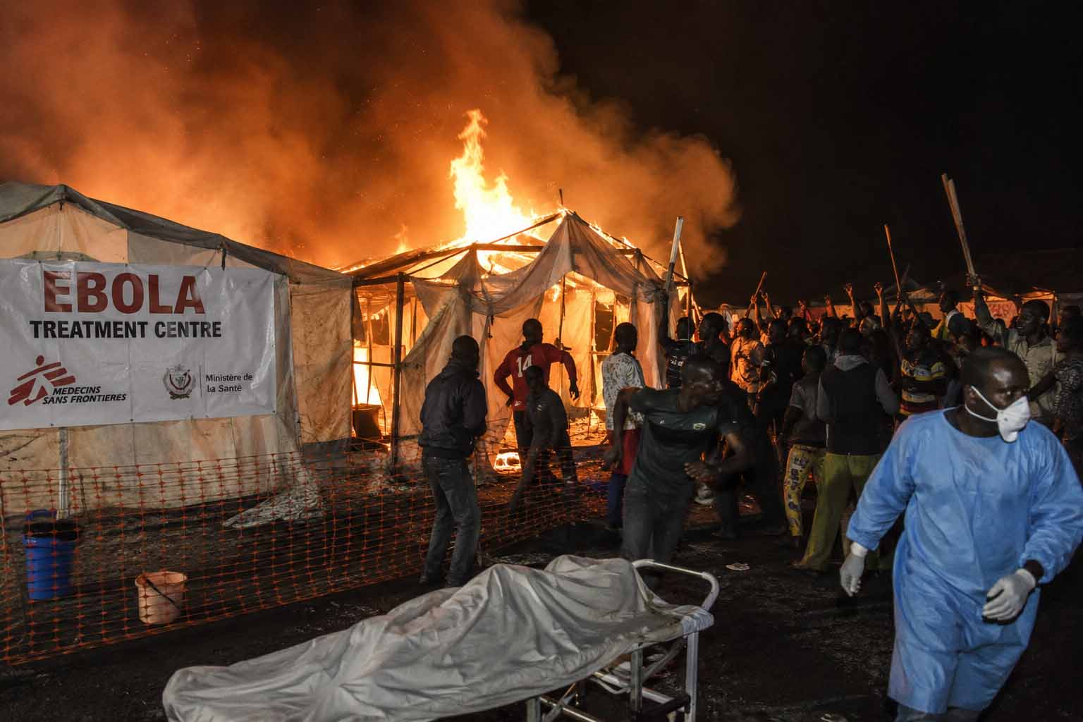 Six Ebola Patients Escape as Angry Residents Torch Treatment Centre (VIDEO) Six Ebola Patients Escape as Angry Residents Torch Treatment Centre