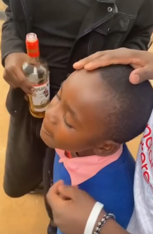 Disturbing Video Shows Two Men Forcing Young Primary School Boy to Drink Dry Captain Morgan Disturbing Video Shows Two Men Forcing Young Primary School Boy to Drink Dry Captain Morgan